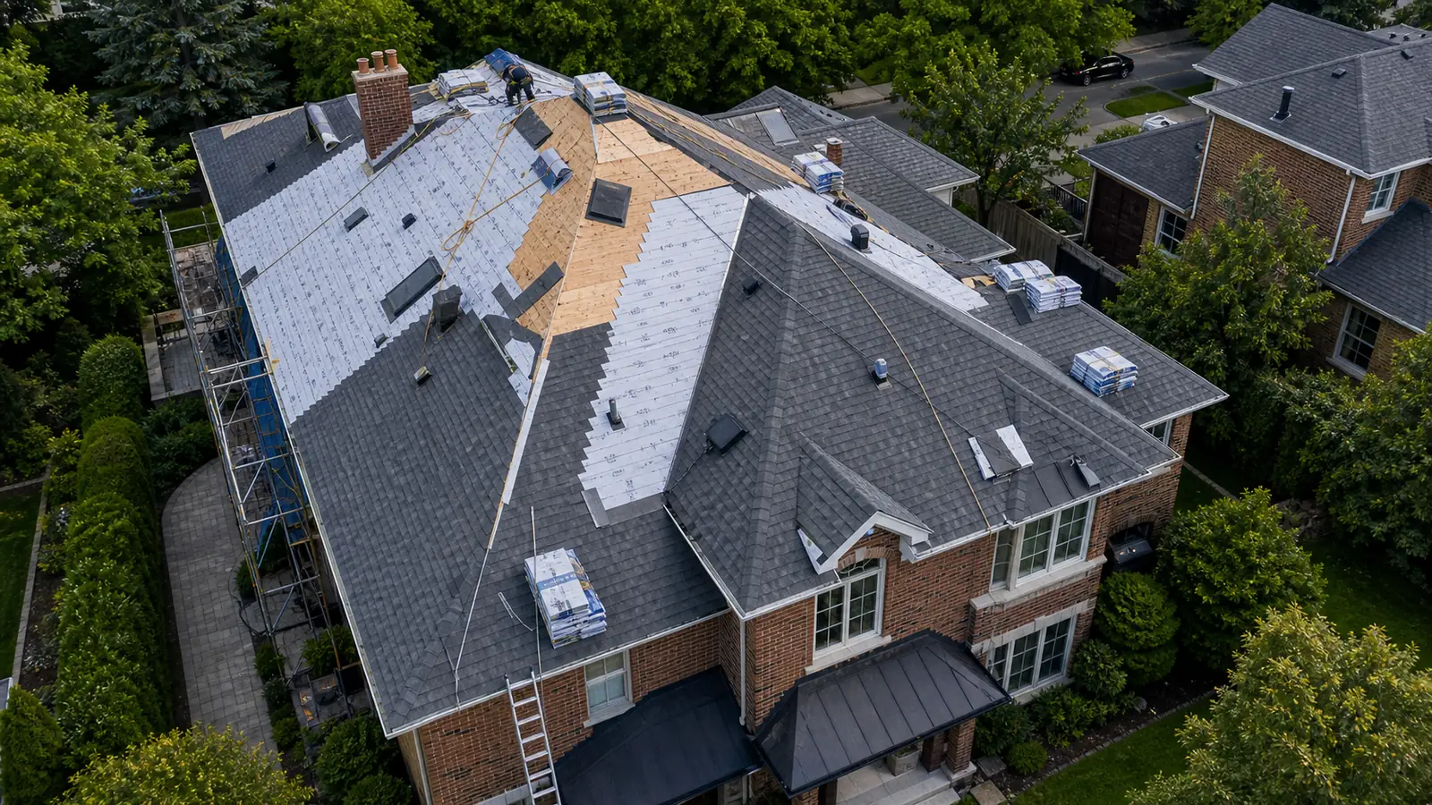 Roof replacement Toronto — full reroof in progress